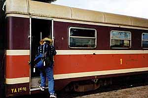 Brian boards the 1st class compartment.