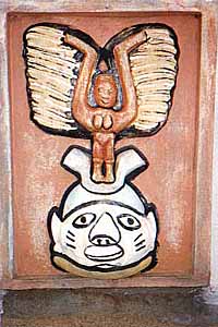The dais is decorated with these painted bas relief faces.