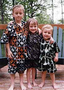 Jesse, Emily, and Sam Hisel love their African duds! Photo by Jeannine Anderson Hisel