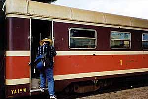 Brian boarding the train from Cotonou to Bohicon, Benin. Click to enter!
